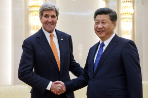 U.S. Secretary of State John Kerry, left, poses with Chinese President Xi Jinping prior to their meeting at the Great Hall of the People in Beijing, Wednesday, Jan. 27, 2016. Kerry is in China on the final leg in his latest round-the-world diplomatic mission. (AP Photo/Jacquelyn Martin, Pool)